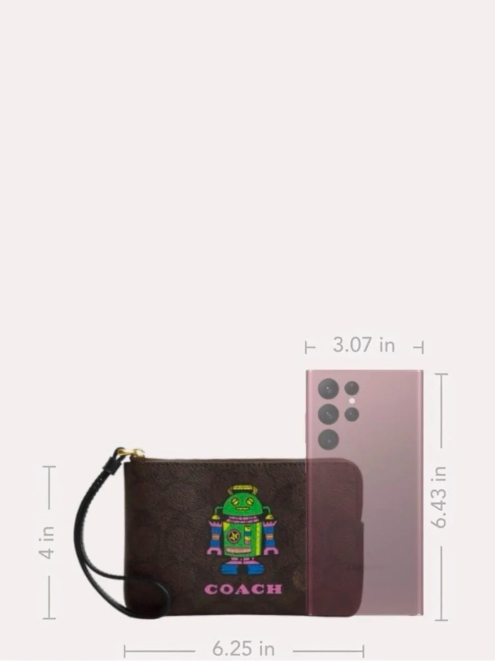 COACH COSMIC CORNER ZIP WRISTLET IN SIGNATURE CANVAS